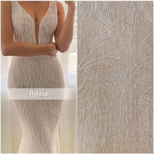 2019 New Style 130 cm high quality exquisite strip sequins off white wedding dress tulle lace fabric