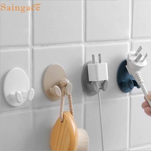 Ouneed Storage Rack Creative Socket Power Cord Storage Rack Hook Multi-function Plug Sticky Hook Organizer Housekeeping 2021 NEW