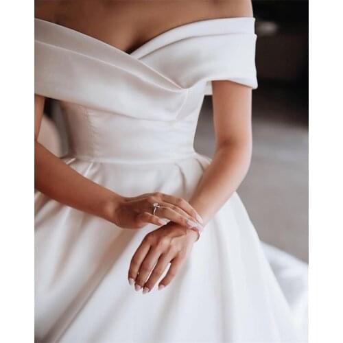 NUOXIFANG Luxury White Satin Ball Gown Wedding Dress 2020 Off The Shoulder Chapel Train Appliques Bride Dresses Vetidos de novia