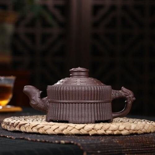 Rhyme sea yixing recommended peng-cheng gu all hand purple clay gossip leading a bundle of bamboo pot of a generation