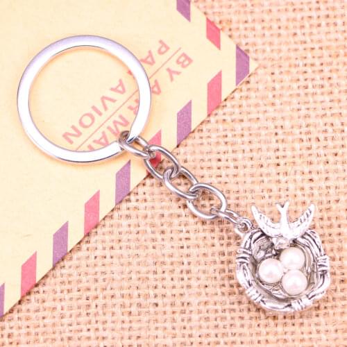 20pcs New Fashion Keychain 24x19x8mm swallow birds nest eggs Pendants DIY Men Jewelry Car Key Chain Souvenir For Gift