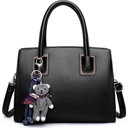 2020 women doll ornamentshandbag ladies embossed shoulder bag ladies Messenger bag hairball bags high quality bag solid color