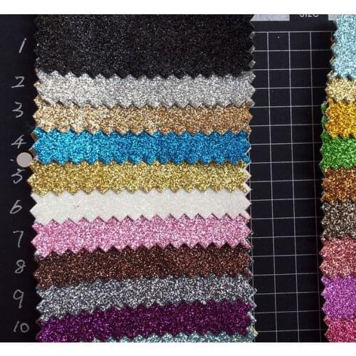 Hot sale synthetic PU fine glitter leather fabrics material 50 yards per roll wholesale