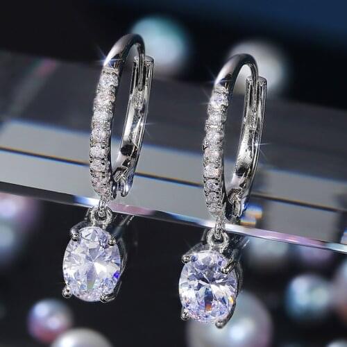 Huitan Silver Color Women Dangle Earring Oval Crystal Cubic Zirconia Elegant Accessories Daily Wear Party Female Fashion Jewelry