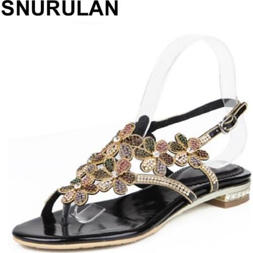 SNURULAN Womens sandals made of genuine leather on a flat sole with crystals; New arrival piquant womens summer sheepskin shoe