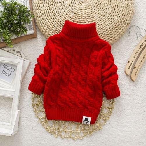 A hair-wearing childrens sweater autumn on the new Korean version of the childrens solid-color high-neck sweater