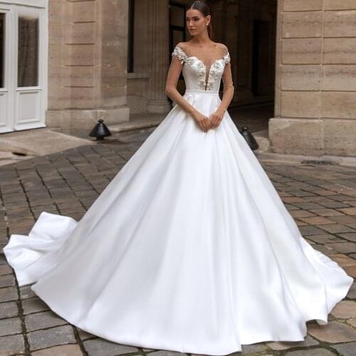 Romantic Luxury Wedding Dress Beaded Applique Belt Round Neck Cap Sleeve Button New A-Shaped Princess Bridal Dress Custom