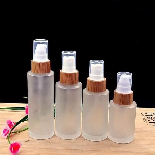 Frosted glass emulsion spray bottle 50pcs Skincare cream jar Cosmetic packaging container with eco-friendly wooden bamboo cap