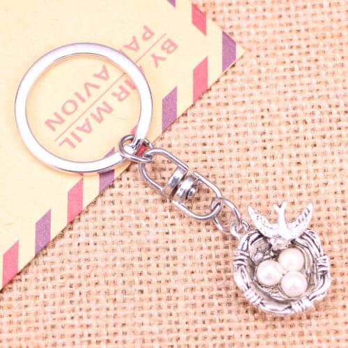 20pcs New Fashion Keychain 24x19x8mm swallow birds nest eggs Pendants DIY Men Jewelry Car Key Chain Souvenir For Gift