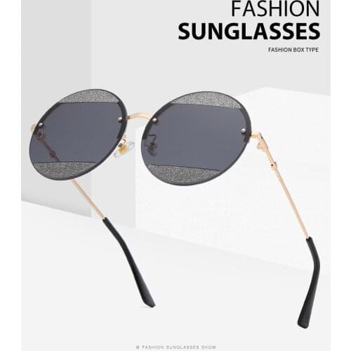 Fashion round frame sunglasses European and American women personality frameless sunglasses women Joker sunglasses tide