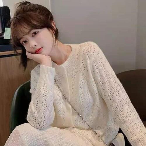 Hollow knitted cardigan womens 2021 spring and autumn new loose sweater long-sleeved round neck single-breasted solid color top