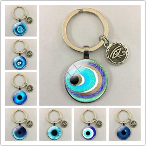 Beautiful blue evil eye religious photo round glass cabochon keychain car keychain fashion charm gift keychain