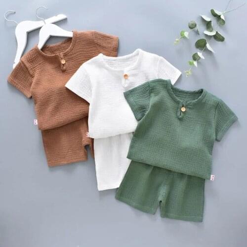 Childrens cotton linen new short sleeve T-shirt shorts for boys girls Baby casual clothing Sets childrens solid sets P5175