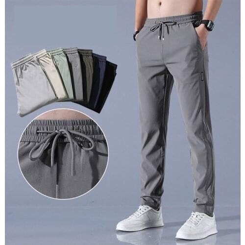 2021 Men Casual Pants Ice Silk Quick Dry Male Trousers Solid Color Elastic Clothing Sportswear Workout Joggers Sweatpants Men