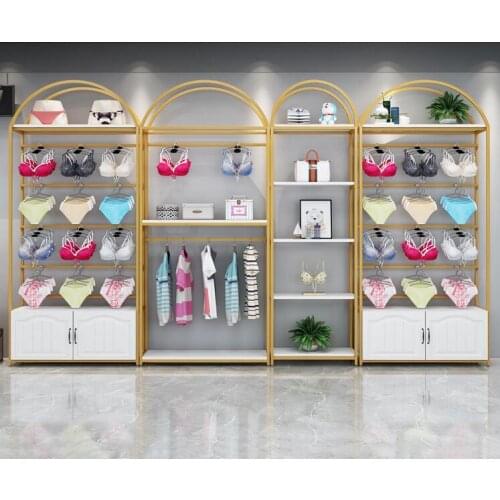 Underwear store shelves Bra underwear display stand against the wall Pajama display cabinet clothing store gold shelf with hooks