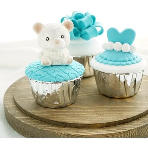 Blue artificial cup cake Beautiful wedding props Creative birthday souvenir on photography background