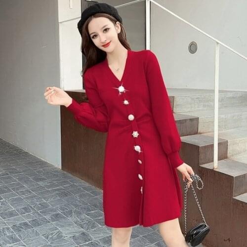 Temperament Korean version of the new knitted dress 2021 autumn and winter pearl diamond pure color long-sleeved sweater dress