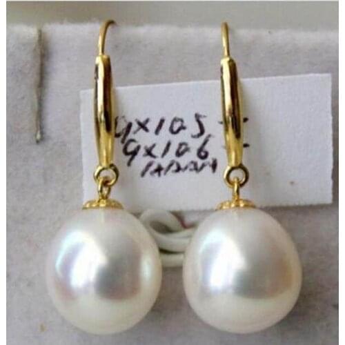 Stunninga pair of 12-13mm natural baroque white pearl earring14k
