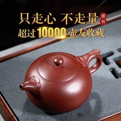 Moistening sand gift Yixing purple clay teapot handmade Xishi Ruyi Kungfu teapot raw ore old purple clay tea set