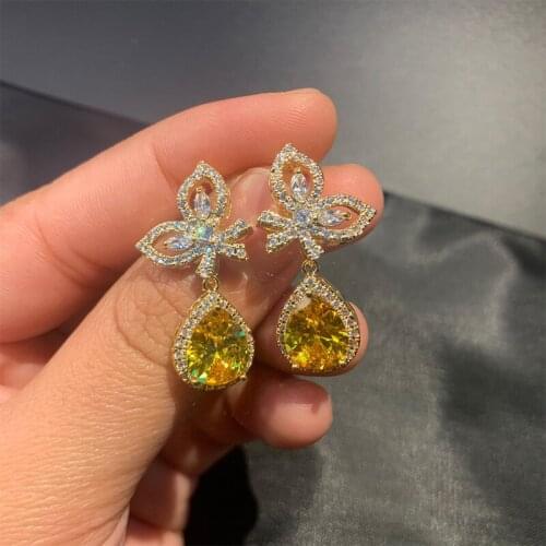 Original new micro-inlaid zircon yellow water drop wing earrings temperament small daily bow delicate ladies silver jewelry