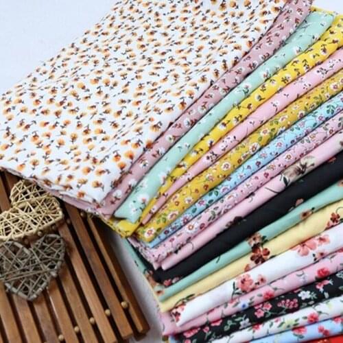 Chiffon printed fabric South Korea silk impervious printing Chiffon summer cool flower skirt fabric wholesale