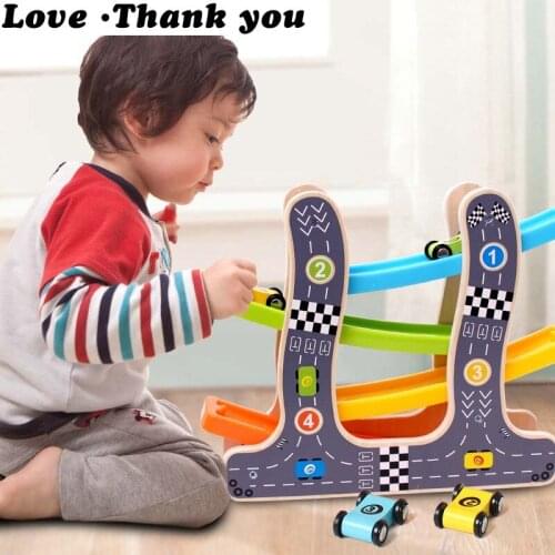 Glider The rail vehicle inertia back of the car developing intelligent toy car track car