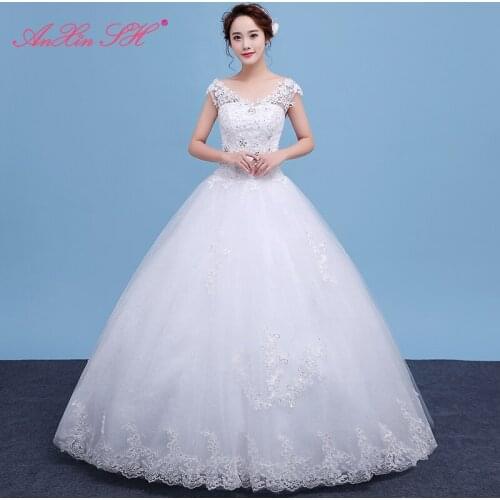 AXJFU princess flower lace white wedding dress vintage illusion v neck beading crystal sleeveless bride ruffles wedding dress
