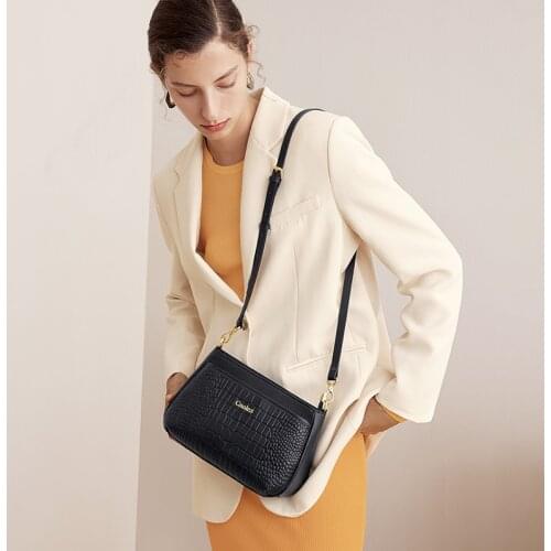 Cnoles 100% Genuine leather Women Shoulder Bangs 2021 Designer handbag trend One Shoulder Messenger Bag Crossbody Bag