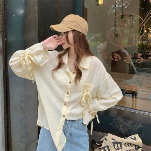 2021 Korean autumn design sense small purse drawstring sunscreen shirt temperament single-breasted blouse