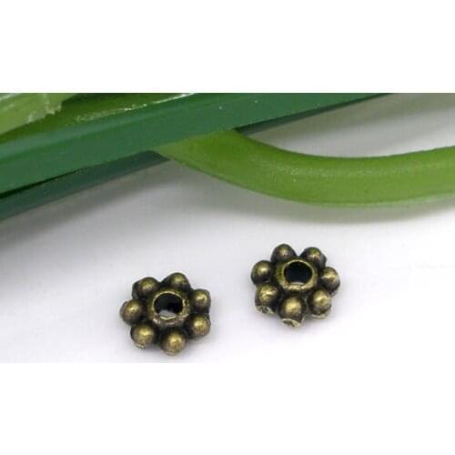 DoreenBeads 1000 Bronze Tone Tiny Daisy Spacers Beads 4MM Findings (B05149), yiwu