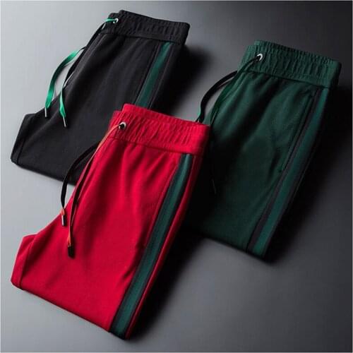 Light luxury autumn new casual pants mens fashion knitted sports pants mens casual feet elastic slim pants