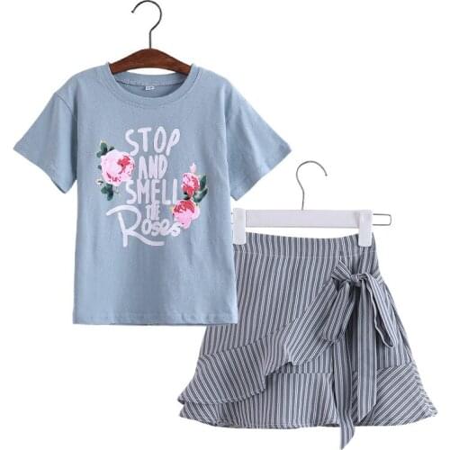 Kids girls short-sleeved suit flower print T-shirt + striped skirt suit 2pcs new fashion big virgin suit