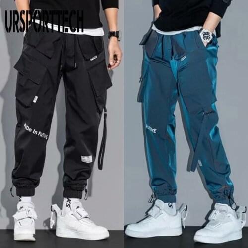 Hip Hop Streetwear Joggers Pants Men Student Casual Cargo Pant Trousers High Street Elastic Waist Loose Laser Harem Pant Boys