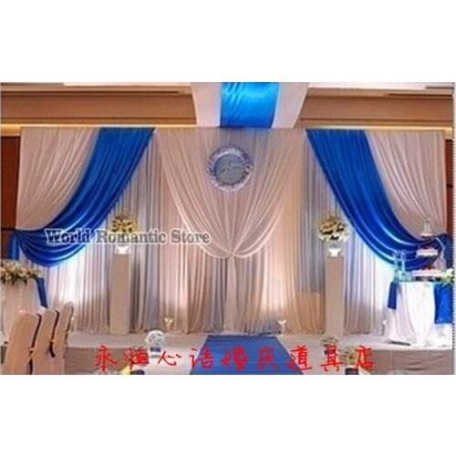 Romantic White Wedding Backdrop with royal blue drapery