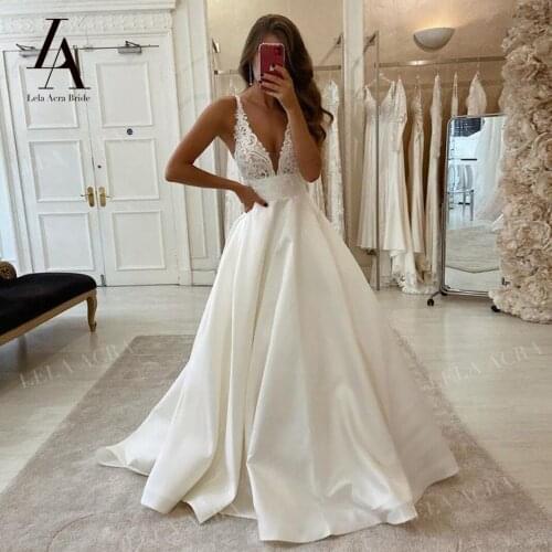 LelaAcra Sleeveless Wedding Dress 2021 Appliqued V-neck Open Back Train Bridal Gown Princess ES01 Plus Size Vestido De Novia