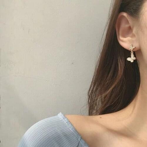 Korean version of creative temperament earrings bow earrings sweet and delicate shell earrings female jewelry gift