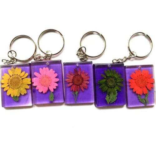 YQTDMY 12 pcs fashion purple back mixed sunflower design vogue keychain