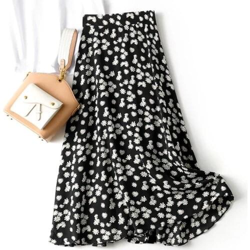 French small daisy floral skirt female 2021 spring and summer new Korean style high waist A-line polka dot mid-length skirt