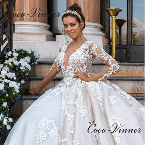 Vintage Lace Appliques Dubai Wedding Dress New V neck 3/4 Sleeves Sexy Illusion Ball Gown Bohemian wedding dress W0510