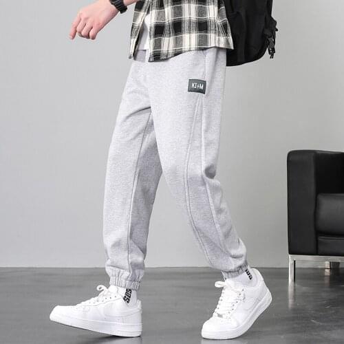 Mens casual pants autumn and winter Korean fashion versatile loose work clothes Leggings sports pants winter pants