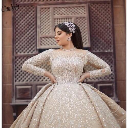 Champagne Chapel Train Illusion Long Sleeve Arabic Ball Gown Wedding Dress Sparkly Beading Crystal Appliques Dubai Bridal Gown