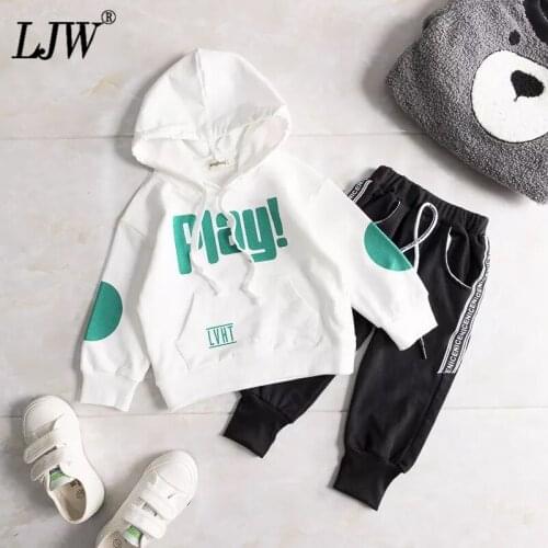 Boys and girls suit new spring and autumn letter sweater top with hood long sleeve + sports trousers feet two-piece baby suit