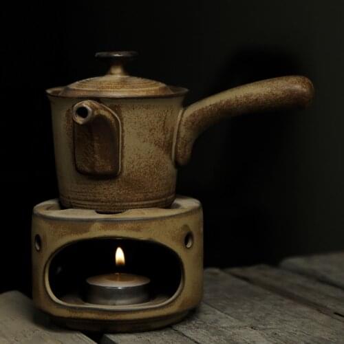The ceramic side turns the teapot kiln into a retro simple household filter single pot ceramic Kung Fu tea set to make a teapot