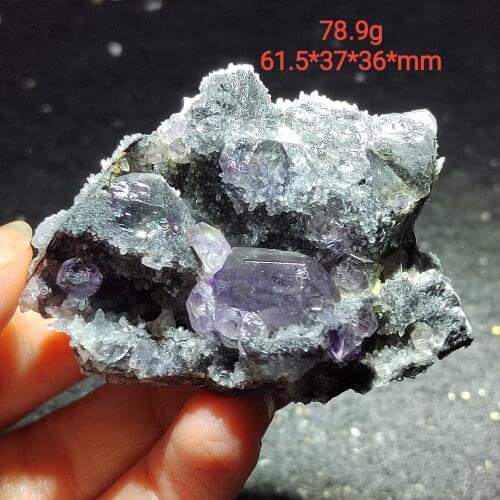 Natural rare purple fluorite and crystal mineral specimens can heal quartz gemstones for home decoration