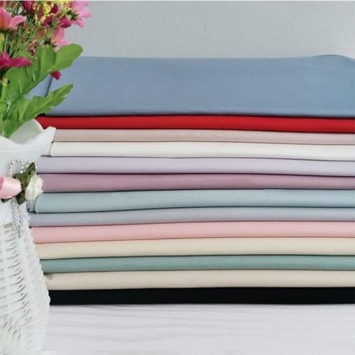 Light gray Tencel Rome ice silk stretch nylon cotton knitted fabric for skirt pants T-shirt apparel fabric