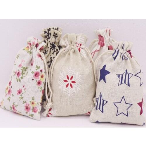 2019 new 50 pcs best selling fashion cotton linen fabric dust candy/gift/party/school bag home Sundry kids toy storage bags