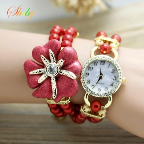 Shsby new high quality Ladies pearl strap starfish flower bracelet quartz wristwatches women dress watches rhinestone watches