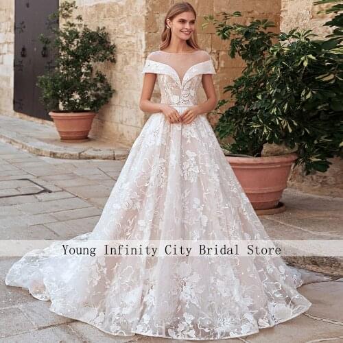 Amazing Champagne Wedding Dress A Line Princess Lace Bride Dress 2020 Short Sleeves Applique Illusion Back Long Bridal Gown