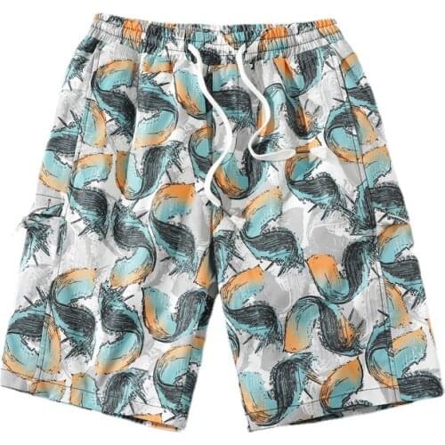 Summer new trend loose printing five-point pants couple beach shorts men