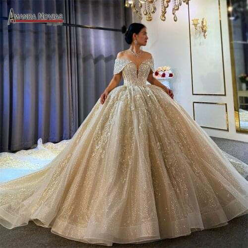 Off the shoulder straps sexy wedding dress puffy ball gown 2021